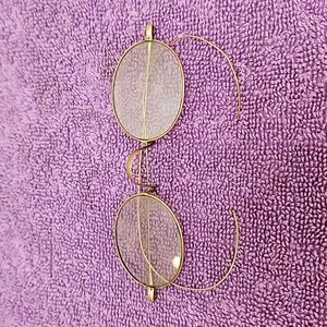 Child's glasses wire rim and ears antigue